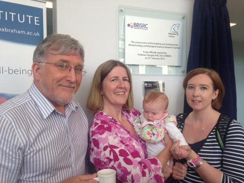 A picture of Michael Wakelam, Anne Corcoran, Danielle Hoyle and Danielle's daughter Matilda at the first BI Athena SWAN silver celebration