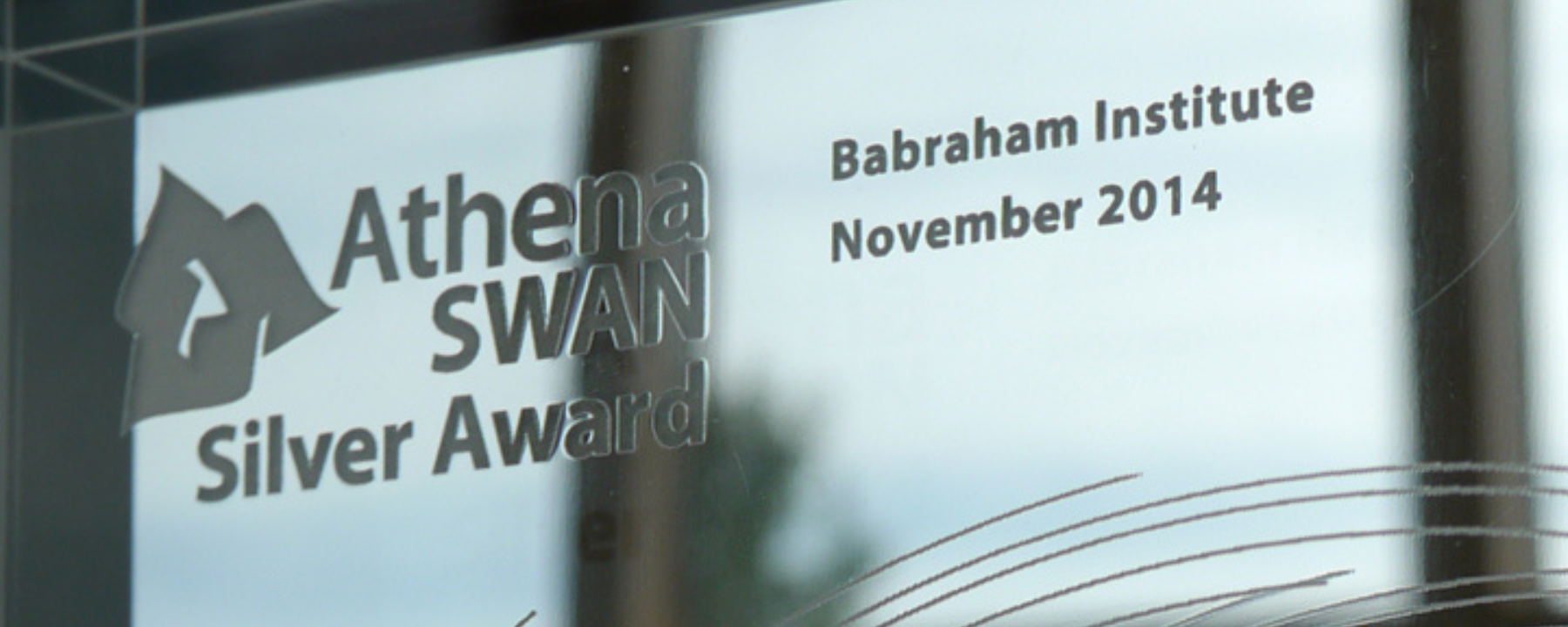 Photo of the Institute's Athena SWAN Silver Award from 2014