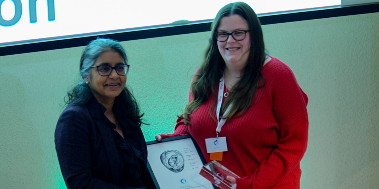 Aimee Paterson (right) received the Sir Colin Blakemore Award from Professor Amrita Ahluwalia
